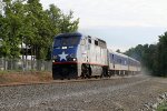 RNCX 1755 leads train 73 southbound